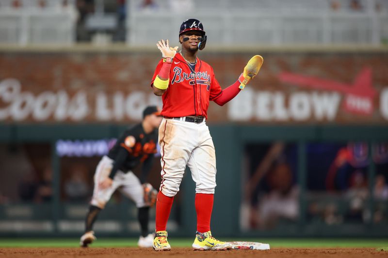 May 5, 2023; Atlanta, Georgia, USA; Atlanta Braves right fielder Ronald Acuna Jr. (13) on second base against the Baltimore Orioles in the eighth inning at Truist Park. Mandatory Credit: Brett Davis-USA TODAY Sports