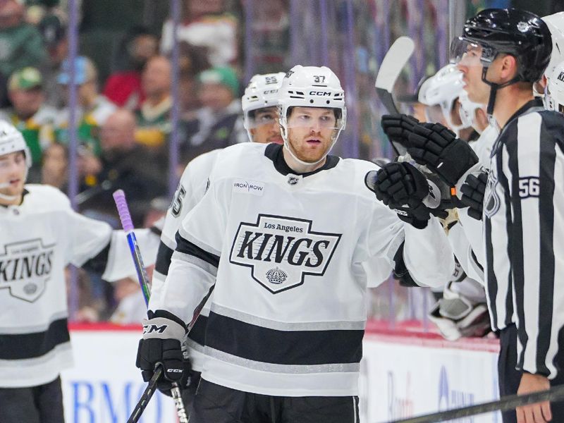 Nov 5, 2024; Saint Paul, Minnesota, USA; Los Angeles Kings left wing Warren Foegele (37) celebrates his goal against the Minnesota Wild in the second period at Xcel Energy Center. Mandatory Credit: Brad Rempel-Imagn Images