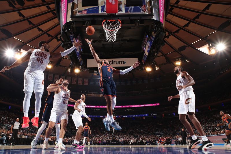 NEW YORK, NY - OCTOBER 28: Miles McBride #2 of the New York Knicks goes up for the rebound during the game against the Cleveland Cavaliers on October 28, 2024 at Madison Square Garden in New York City, New York.  NOTE TO USER: User expressly acknowledges and agrees that, by downloading and or using this photograph, User is consenting to the terms and conditions of the Getty Images License Agreement. Mandatory Copyright Notice: Copyright 2024 NBAE  (Photo by Nathaniel S. Butler/NBAE via Getty Images)