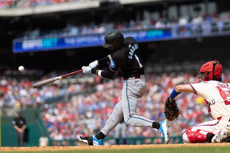 Jun 29, 2024; Philadelphia, Pennsylvania, USA; Miami Marlins outfielder Nick Gordon (1) hits a home run during the second inning against the Philadelphia Phillies at Citizens Bank Park. Mandatory Credit: Bill Streicher-USA TODAY Sports