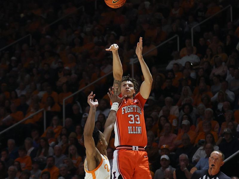 Dec 9, 2023; Knoxville, Tennessee, USA; Illinois Fighting Illini forward Coleman Hawkins (33) shoots a three point basket against the Tennessee Volunteers during the first half at Food City Center at Thompson Boling Arena. Mandatory Credit: Randy Sartin-USA TODAY Sports