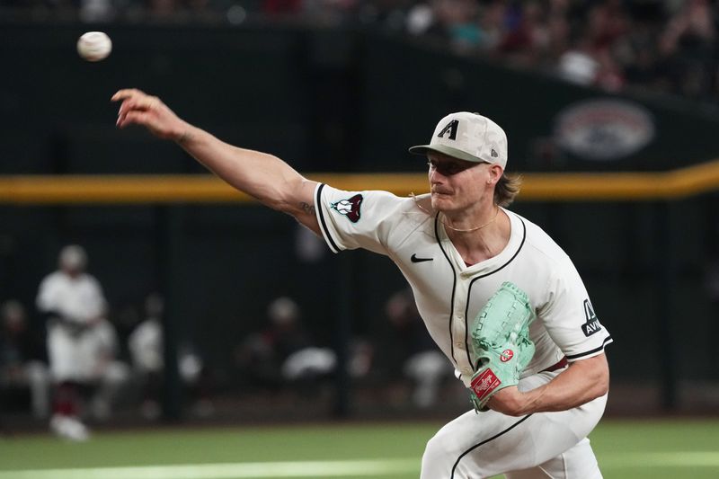May 18, 2025; Phoenix, Arizona, USA; Arizona Diamondbacks pitcher Shelby Miller (18) throws against the Colorado Rockies in the ninth inning at Chase Field. Mandatory Credit: Rick Scuteri-Imagn Images