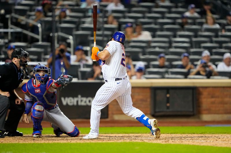 Aug 30, 2023; New York City, New York, USA; New York Mets right fielder DJ Steward (29) gets hit by a pitch with the bases loaded during the tenth inning against the Texas Rangers at Citi Field. Mandatory Credit: Gregory Fisher-USA TODAY Sports