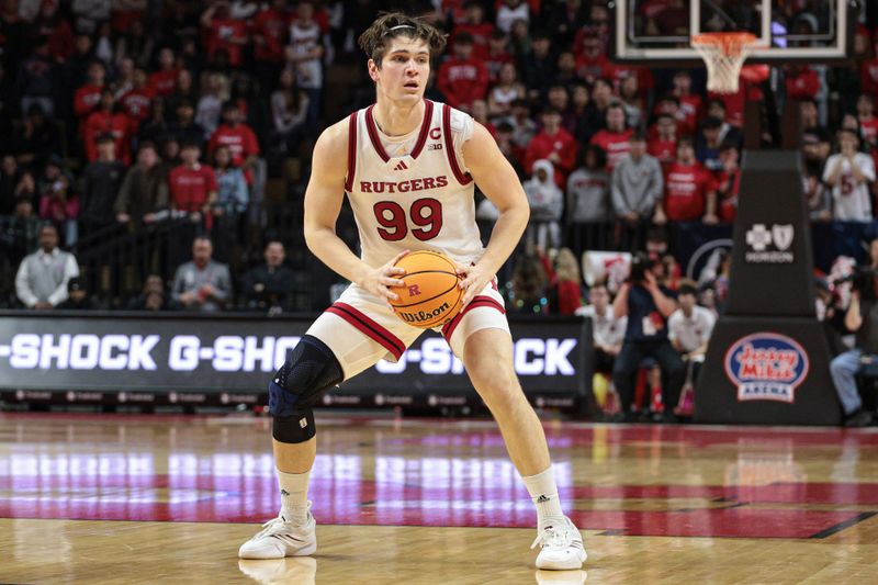 Feb 12, 2025; Piscataway, New Jersey, USA; Rutgers Scarlet Knights center Zach Martini (99) looks to pass during the second half against the Iowa Hawkeyes at Jersey Mike's Arena. Mandatory Credit: Vincent Carchietta-Imagn Images