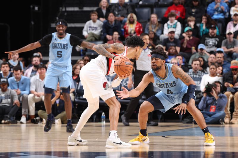 MEMPHIS, TN - MARCH 2:Jordan Goodwin #4 of the Memphis Grizzlies plays defense during the game against the Portland Trail Blazers  on March 2, 2024 at FedExForum in Memphis, Tennessee. NOTE TO USER: User expressly acknowledges and agrees that, by downloading and or using this photograph, User is consenting to the terms and conditions of the Getty Images License Agreement. Mandatory Copyright Notice: Copyright 2024 NBAE (Photo by Joe Murphy/NBAE via Getty Images)