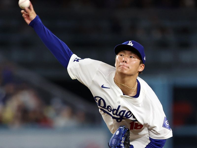 Jun 1, 2024; Los Angeles, California, USA;  Los Angeles Dodgers starting pitcher Yoshinobu Yamamoto (18) pitches during the sixth inning against the Colorado Rockies at Dodger Stadium. Mandatory Credit: Kiyoshi Mio-USA TODAY Sports