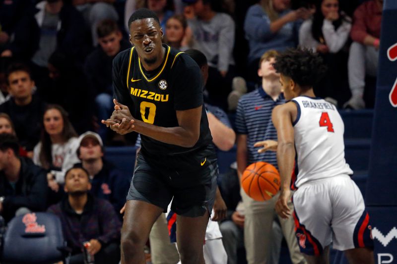 Jan 24, 2023; Oxford, Mississippi, USA; Mississippi Rebels forward Jayveous McKinnis (0) reacts after a basket during the second half against the Mississippi Rebels at The Sandy and John Black Pavilion at Ole Miss. Mandatory Credit: Petre Thomas-USA TODAY Sports