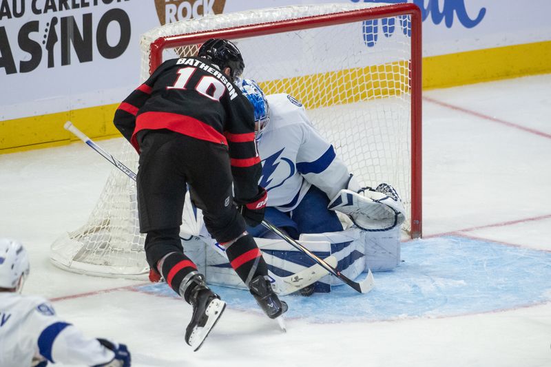 Nov 4, 2023; Ottawa, Ontario, CAN; Tampa Bay Lightning goalie Jonas Johansson (31) makes a save on a shot from Ottawa Senators right wing Drake Batherson (19) in the third period at the Canadian Tire Centre. Mandatory Credit: Marc DesRosiers-USA TODAY Sports