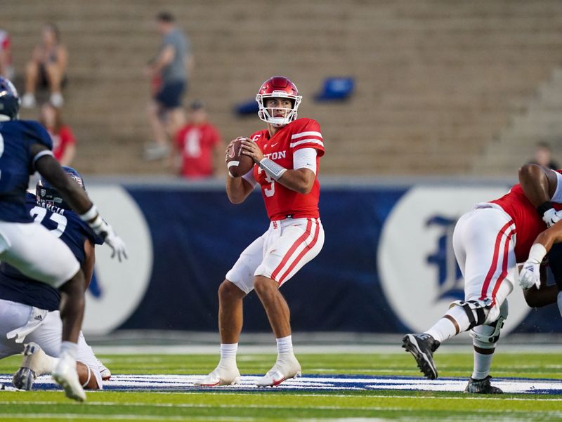 Sep 11, 2021; Houston, Texas, USA; Houston Cougars quarterback Clayton Tune (3) looks to pass in the second half against the Rice Owls at Rice Stadium. Mandatory Credit: Daniel Dunn-USA TODAY Sports