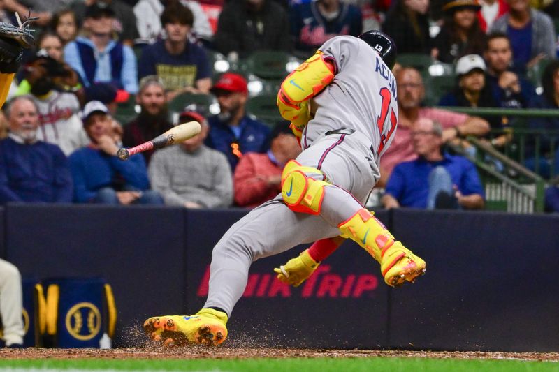 Jun 9, 2025; Milwaukee, Wisconsin, USA; Atlanta Braves right fielder Ronald Acuna (13) ducks away from an inside pitch in the ninth inning against the Milwaukee Brewers at American Family Field. Mandatory Credit: Benny Sieu-Imagn Images