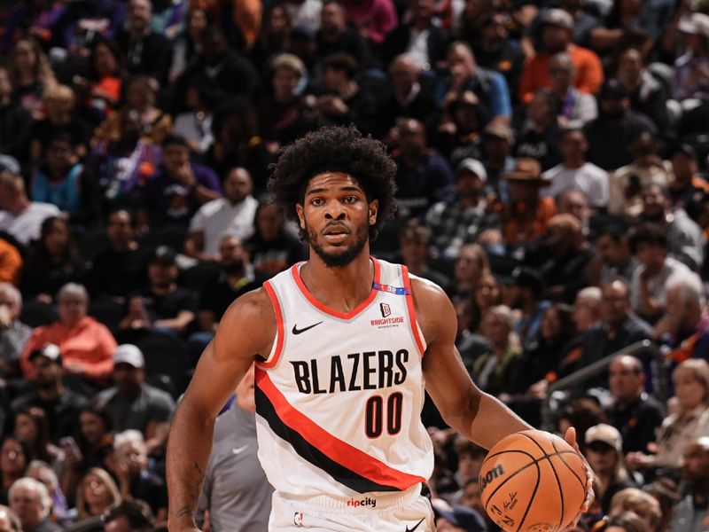 PHOENIX, AZ - NOVEMBER 2: Scoot Henderson #00 of the Portland Trail Blazers dribbles the ball during the game against the Phoenix Suns on November 2, 2024 at Footprint Center in Phoenix, Arizona. NOTE TO USER: User expressly acknowledges and agrees that, by downloading and or using this photograph, user is consenting to the terms and conditions of the Getty Images License Agreement. Mandatory Copyright Notice: Copyright 2024 NBAE (Photo by Kate Frese/NBAE via Getty Images)