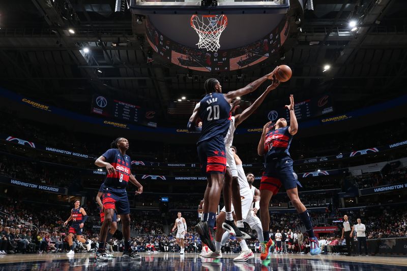 WASHINGTON, DC -? OCTOBER 26: Alexandre Sarr #20 of the Washington Wizards blocks a shot during the game against the Cleveland Cavaliers on October 26, 2024 at Capital One Arena in Washington, DC. NOTE TO USER: User expressly acknowledges and agrees that, by downloading and or using this Photograph, user is consenting to the terms and conditions of the Getty Images License Agreement. Mandatory Copyright Notice: Copyright 2024 NBAE (Photo by Stephen Gosling/NBAE via Getty Images)