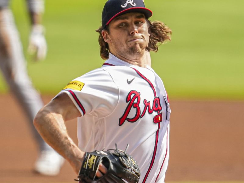 Oct 1, 2023; Cumberland, Georgia, USA; Atlanta Braves starting pitcher Dylan Dodd (46) pitches against the Washington Nationals during the first inning at Truist Park. Mandatory Credit: Dale Zanine-USA TODAY Sports