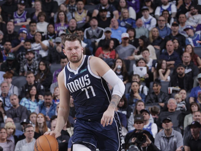 SACRAMENTO, CA - MARCH 29:  Luka Doncic #77 of the Dallas Mavericks handles the ball during the game  on March 29, 2024 at Golden 1 Center in Sacramento, California. NOTE TO USER: User expressly acknowledges and agrees that, by downloading and or using this Photograph, user is consenting to the terms and conditions of the Getty Images License Agreement. Mandatory Copyright Notice: Copyright 2024 NBAE (Photo by Rocky Widner/NBAE via Getty Images)