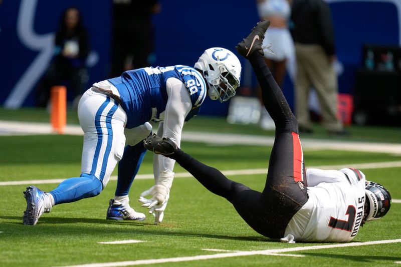 Houston Texans quarterback C.J. Stroud (7) is sacked by Indianapolis Colts defensive tackle DeForest Buckner (99) during the first half of an NFL football game, Sunday, Sept. 8, 2024, in Indianapolis. (AP Photo/Darron Cummings)