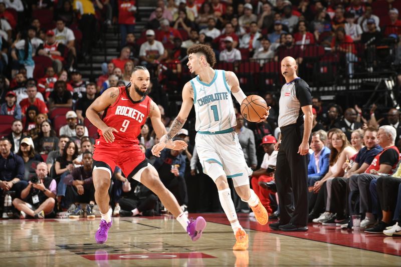 HOUSTON, TX - OCTOBER 23:  LaMelo Ball #1 of the Charlotte Hornets dribbles the ball during the game against the Houston Rockets during a regular season game on October 23, 2024 at the Toyota Center in Houston, Texas. NOTE TO USER: User expressly acknowledges and agrees that, by downloading and or using this photograph, User is consenting to the terms and conditions of the Getty Images License Agreement. Mandatory Copyright Notice: Copyright 2024 NBAE (Photo by Logan Riely/NBAE via Getty Images)