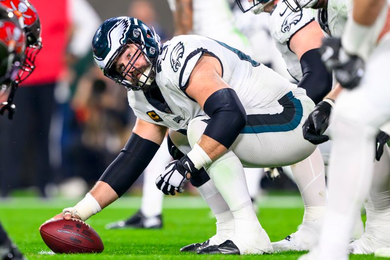 Philadelphia Eagles center Jason Kelce (62) prepares to snap the ball at the line of scrimmage against the Tampa Bay Buccaneers during an NFL wild-card playoff football game, Monday, Jan. 15, 2024 in Tampa, Fla. (AP Photo/Doug Murray)