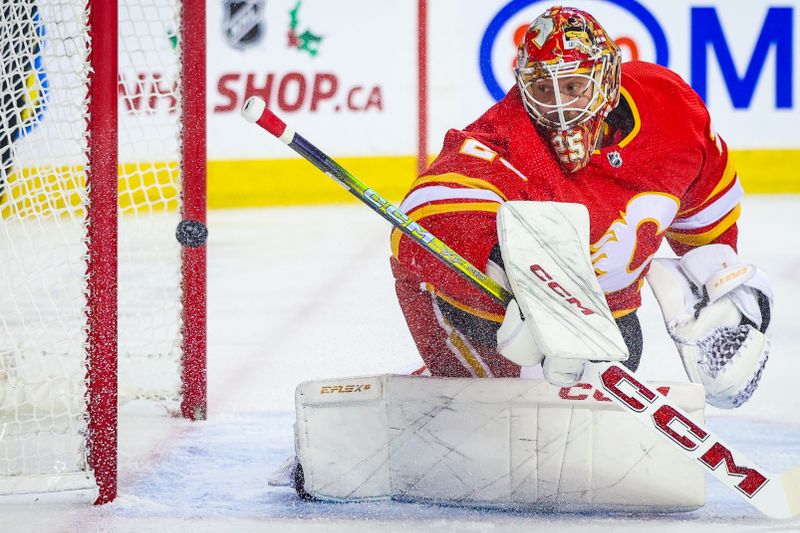 Nov 30, 2023; Calgary, Alberta, CAN; Calgary Flames goaltender Jacob Markstrom (25) reacts to the goal by Dallas Stars defenseman Thomas Harley (not pictured) during the first period at Scotiabank Saddledome. Mandatory Credit: Sergei Belski-USA TODAY Sports