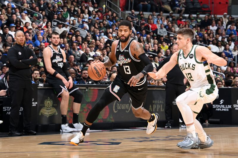 LOS ANGELES, CA - FEBRUARY 10: Paul George #13 of the LA Clippers dribbles the ball during the game against the Milwaukee Bucks on February 10, 2023 at Crypto.Com Arena in Los Angeles, California. NOTE TO USER: User expressly acknowledges and agrees that, by downloading and/or using this Photograph, user is consenting to the terms and conditions of the Getty Images License Agreement. Mandatory Copyright Notice: Copyright 2023 NBAE (Photo by Andrew D. Bernstein/NBAE via Getty Images)