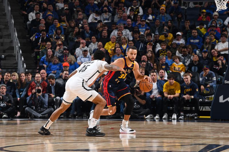 SAN FRANCISCO, CA - NOVEMBER 25: Stephen Curry #30 of the Golden State Warriors handles the ball during the game against the Brooklyn Nets on November 25, 2024 at Chase Center in San Francisco, California. NOTE TO USER: User expressly acknowledges and agrees that, by downloading and or using this photograph, user is consenting to the terms and conditions of Getty Images License Agreement. Mandatory Copyright Notice: Copyright 2024 NBAE (Photo by Noah Graham/NBAE via Getty Images)