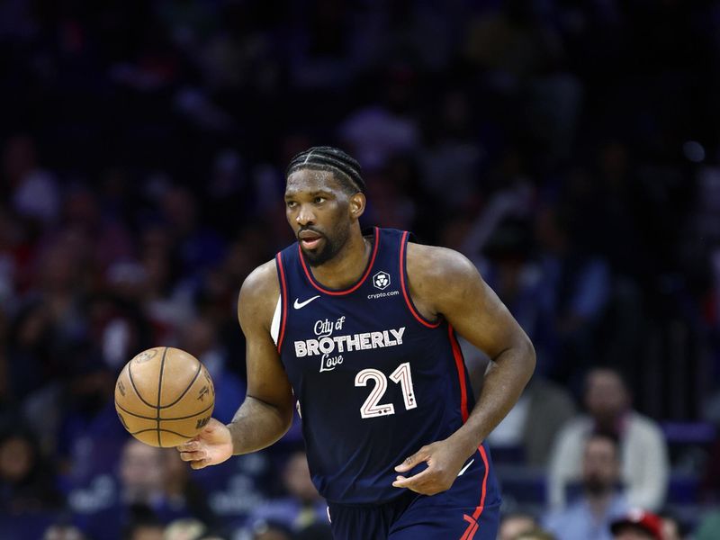 PHILADELPHIA, PENNSYLVANIA - APRIL 09: Joel Embiid #21 of the Philadelphia 76ers dribbles during the fourth quarter against the Detroit Pistons at the Wells Fargo Center on April 09, 2024 in Philadelphia, Pennsylvania. (Photo by Tim Nwachukwu/Getty Images)