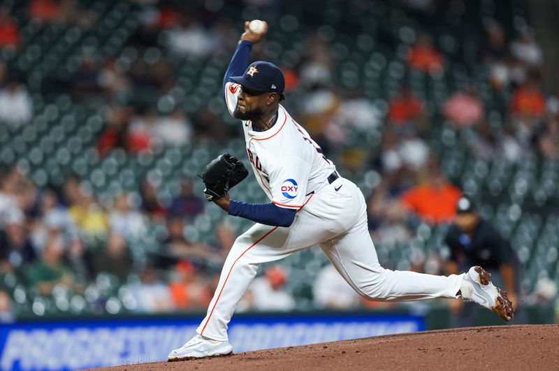 May 16, 2024; Houston, Texas, USA; Houston Astros starting pitcher Cristian Javier (53) delivers a pitch during the first inning against the Oakland Athletics at Minute Maid Park. Mandatory Credit: Troy Taormina-USA TODAY Sports