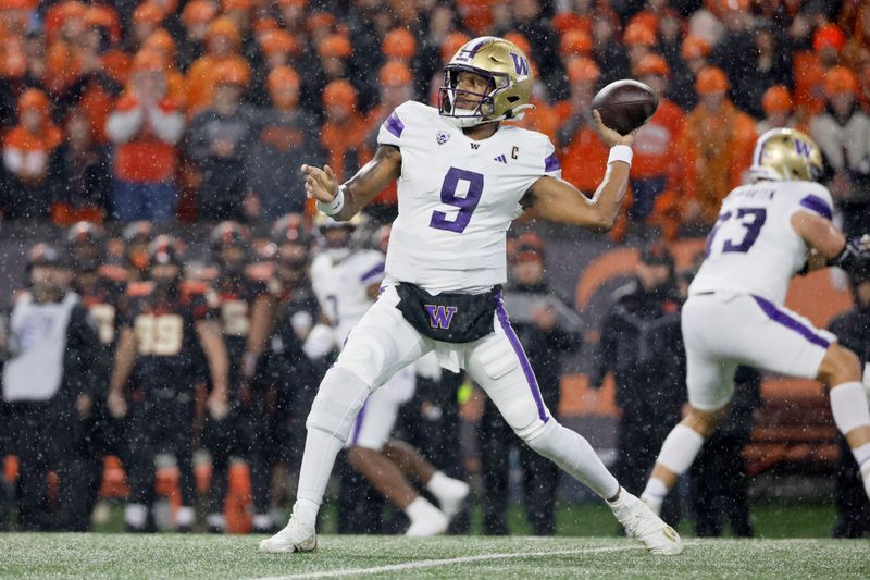 Nov 18, 2023; Corvallis, Oregon, USA; Washington Huskies quarterback Michael Penix Jr. (9) throws the ball during the first half against the Oregon State Beavers at Reser Stadium. Mandatory Credit: Soobum Im-USA TODAY Sports