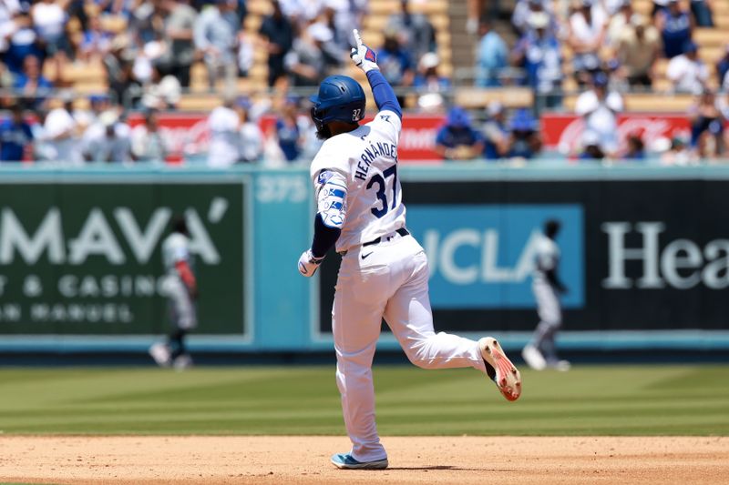 May 8, 2024; Los Angeles, California, USA;  Los Angeles Dodgers outfielder Teoscar Hernandez (37) runs the bases after hitting a two-run home run during the sixth inning against the Miami Marlins at Dodger Stadium. Mandatory Credit: Kiyoshi Mio-USA TODAY Sports