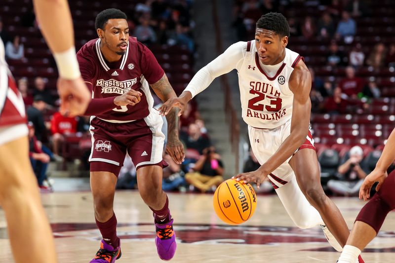 Jan 31, 2023; Columbia, South Carolina, USA; South Carolina Gamecocks forward Gregory Jackson II (23) drives around Mississippi State Bulldogs guard Shakeel Moore (3) in the first half at Colonial Life Arena. Mandatory Credit: Jeff Blake-USA TODAY Sports