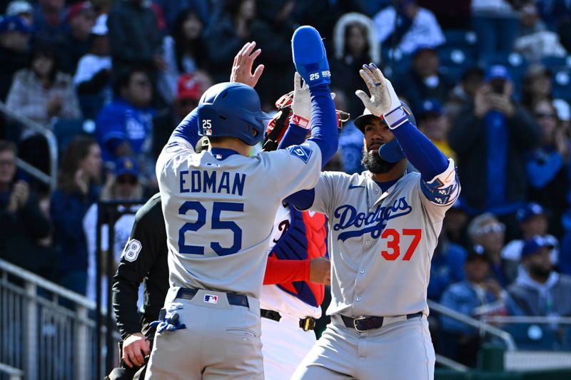 Apr 9, 2025; Washington, District of Columbia, USA; Los Angeles Dodgers outfielder Teoscar Hernández (37) is congratulated by outfielder Tommy Edman (25) after hitting a two run home run against the Washington Nationals during the first inning at Nationals Park. Mandatory Credit: Brad Mills-Imagn Images