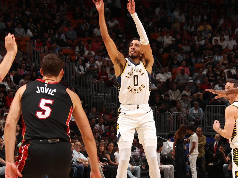 MIAMI, FL - JANUARY 2: Tyrese Haliburton #0 of the Indiana Pacers three point basket during the game against the Miami Heat on January 2, 2025 at Kaseya Center in Miami, Florida. NOTE TO USER: User expressly acknowledges and agrees that, by downloading and or using this Photograph, user is consenting to the terms and conditions of the Getty Images License Agreement. Mandatory Copyright Notice: Copyright 2025 NBAE (Photo by Issac Baldizon/NBAE via Getty Images)