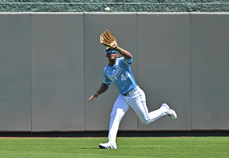 May 18, 2025; Kansas City, Missouri, USA;  Kansas City Royals center fielder Dairon Blanco (44) catches a fly ball in the first inning against the St. Louis Cardinals at Kauffman Stadium. Mandatory Credit: Peter Aiken-Imagn Images