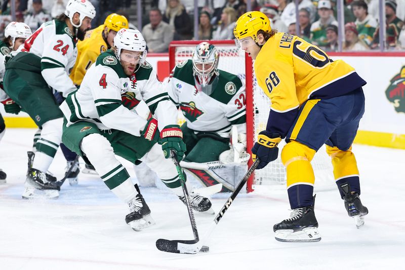 Nov 30, 2024; Saint Paul, Minnesota, USA; Nashville Predators left wing Zachary L'Heureux (68) and Minnesota Wild defenseman Jon Merrill (4) compete for the puck during the first period at Xcel Energy Center. Mandatory Credit: Matt Krohn-Imagn Images