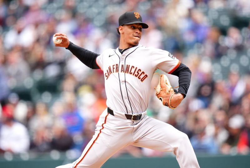 May 9, 2024; Denver, Colorado, USA; San Francisco Giants relief pitcher Randy Rodríguez (73) delivers a pitch in fifth inning against the Colorado Rockies at Coors Field. Mandatory Credit: Ron Chenoy-USA TODAY Sports