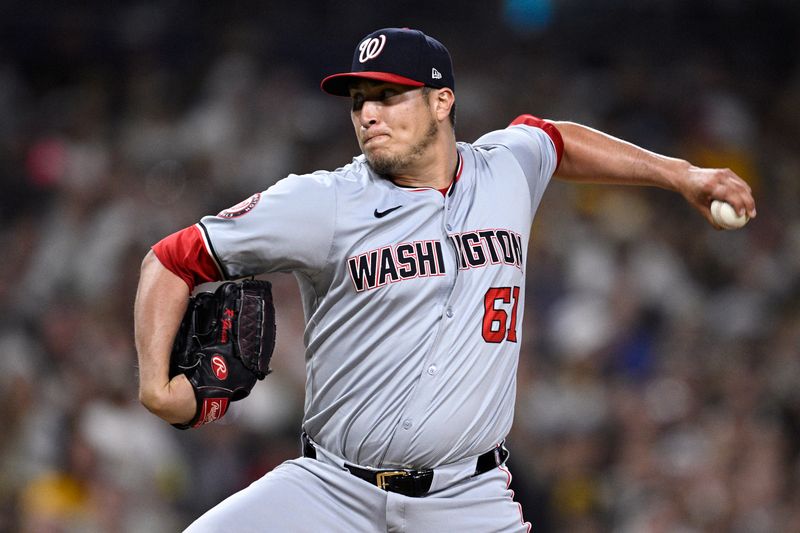 Jun 24, 2024; San Diego, California, USA; Washington Nationals relief pitcher Robert Garcia (61) pitches against the San Diego Padres during the ninth inning at Petco Park. Mandatory Credit: Orlando Ramirez-USA TODAY Sports