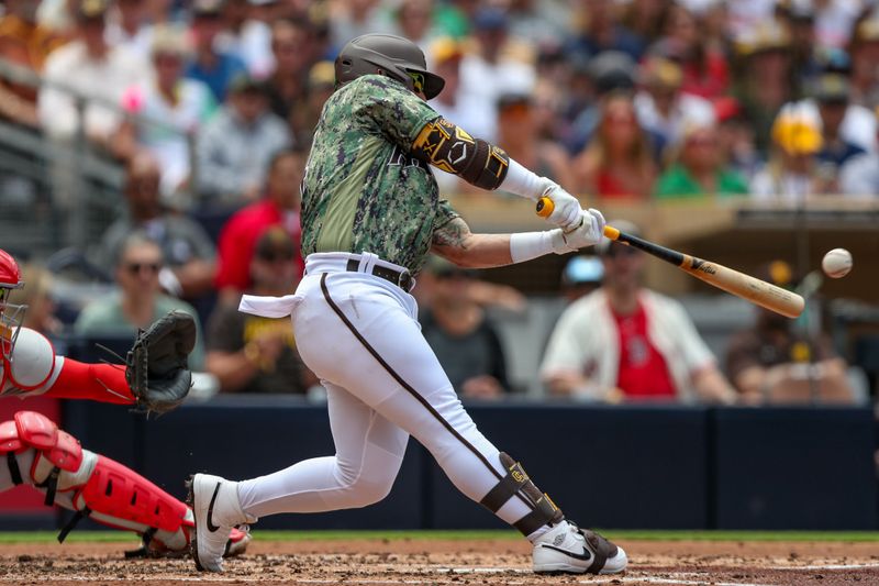 May 21, 2023; San Diego, California, USA; San Diego Padres second baseman Rougned Odor (24) hits a three RBI double in the first inning against the Boston Red Sox at Petco Park. Mandatory Credit: David Frerker-USA TODAY Sports

