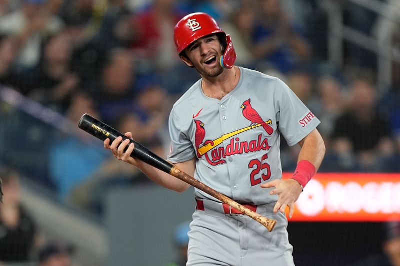 Sep 13, 2024; Toronto, Ontario, CAN; St. Louis Cardinals second baseman Thomas Saggese (25) reacts after striking out against the Toronto Blue Jays during the 10th inning at Rogers Centre. Mandatory Credit: John E. Sokolowski-Imagn Images