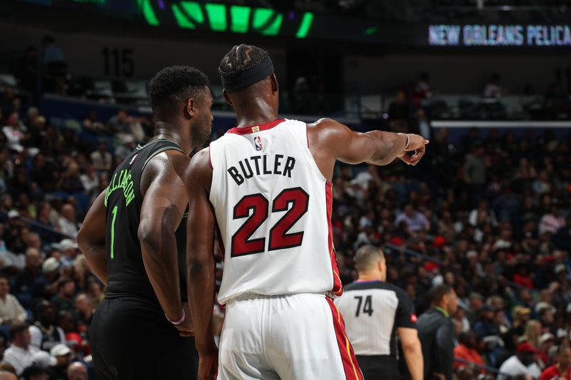 NEW ORLEANS, LA - FEBRUARY 23: Zion Williamson #1 of the New Orleans Pelicans talks with Jimmy Butler #22 of the Miami Heat during the game on February 23, 2024 at the Smoothie King Center in New Orleans, Louisiana. NOTE TO USER: User expressly acknowledges and agrees that, by downloading and or using this Photograph, user is consenting to the terms and conditions of the Getty Images License Agreement. Mandatory Copyright Notice: Copyright 2024 NBAE (Photo by Layne Murdoch Jr./NBAE via Getty Images)