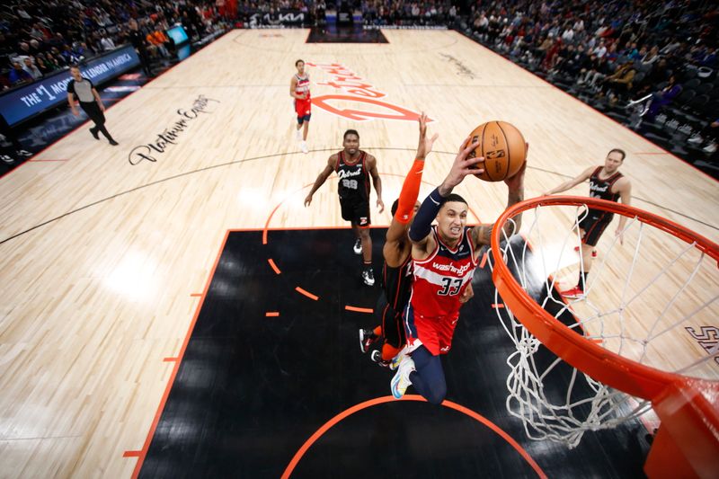 DETROIT, MI - JANUARY 27: Kyle Kuzma #33 of the Washington Wizards drives to the basket during the game against the Detroit Pistons on January 27, 2024 at Little Caesars Arena in Detroit, Michigan. NOTE TO USER: User expressly acknowledges and agrees that, by downloading and/or using this photograph, User is consenting to the terms and conditions of the Getty Images License Agreement. Mandatory Copyright Notice: Copyright 2024 NBAE (Photo by Brian Sevald/NBAE via Getty Images)