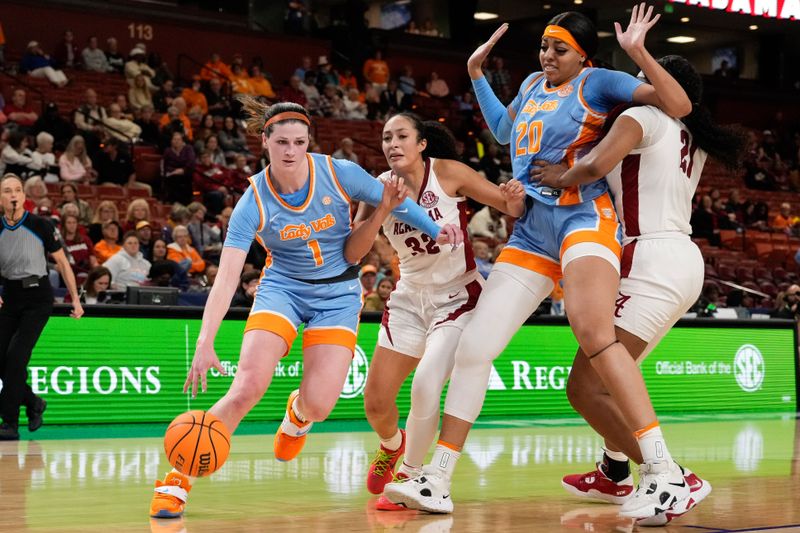 Mar 8, 2024; Greensville, SC, USA; Tennessee Lady Vols guard Sara Puckett (1) drives to the basket defended by Alabama Crimson Tide guard Aaliyah Nye (32) during the second half at Bon Secours Wellness Arena. Mandatory Credit: Jim Dedmon-USA TODAY Sports