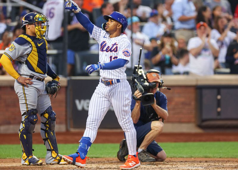 Jun 27, 2023; New York City, New York, USA; New York Mets shortstop Francisco Lindor (12) celebrates after his solo home run during the fourth inning against the Milwaukee Brewers at Citi Field. Mandatory Credit: Vincent Carchietta-USA TODAY Sports