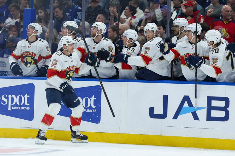 Dec 15, 2025; Tampa, Florida, USA; Florida Panthers center Sam Reinhart (13) reacts after scoring a goal against the Tampa Bay Lightning in the first period at Benchmark International Arena. Mandatory Credit: Nathan Ray Seebeck-Imagn Images