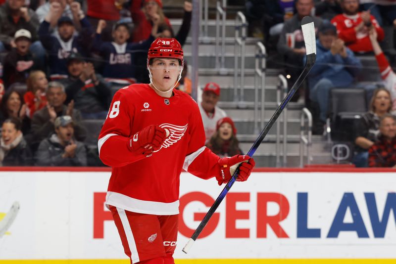 Oct 25, 2025; Detroit, Michigan, USA;  Detroit Red Wings right wing Jonatan Berggren (48) celebrates after scoring in the second period against the St. Louis Blues at Little Caesars Arena. Mandatory Credit: Rick Osentoski-Imagn Images