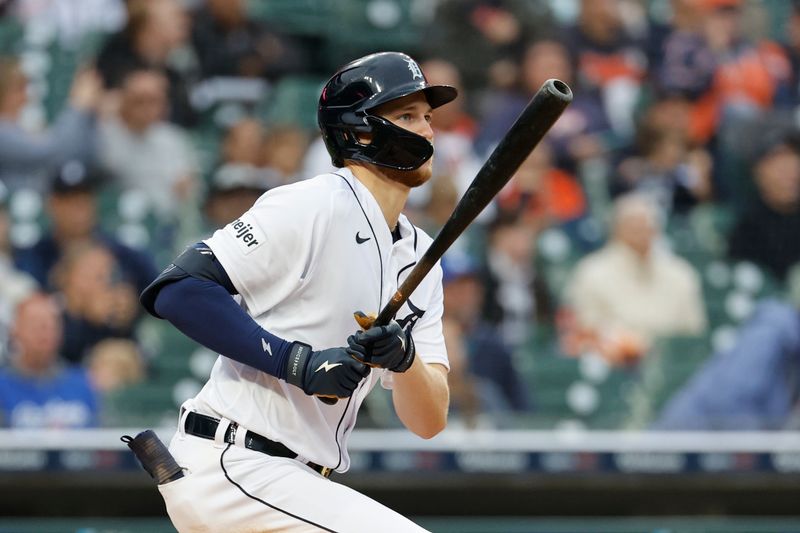 Sep 28, 2023; Detroit, Michigan, USA; Detroit Tigers center fielder Parker Meadows (22) hits a two RBI single in the seventh inning against the Kansas City Royals at Comerica Park. Mandatory Credit: Rick Osentoski-USA TODAY Sports