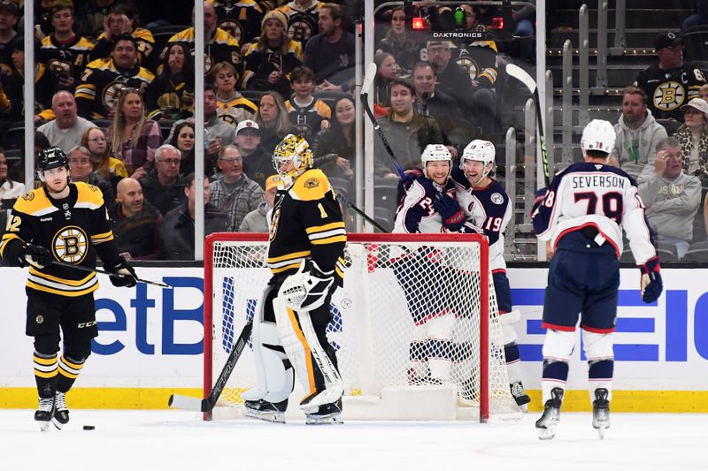 Nov 18, 2024; Boston, Massachusetts, USA;  Columbus Blue Jackets right wing Mathieu Olivier (24) reacts with center Adam Fantilli (19) after scoring a goal during the first period against the Boston Bruins at TD Garden. Mandatory Credit: Bob DeChiara-Imagn Images