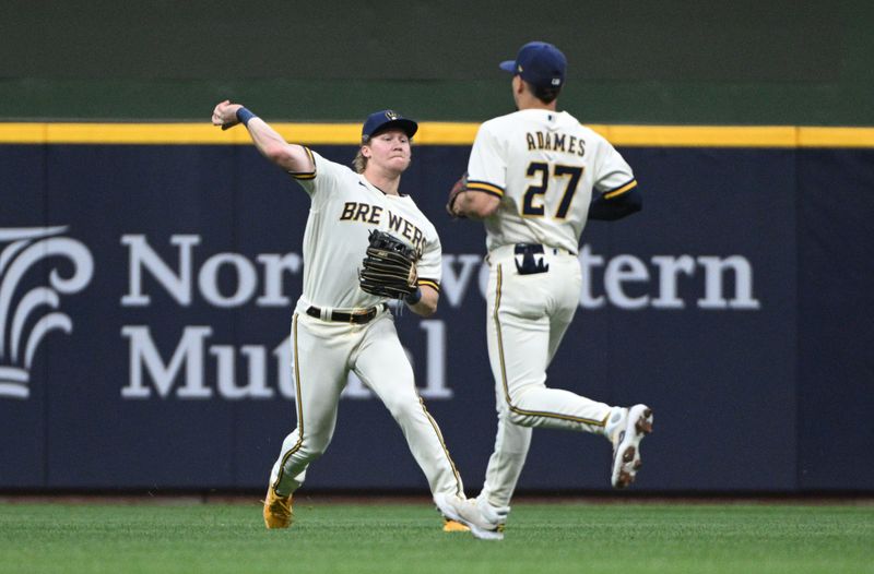 May 23, 2023; Milwaukee, Wisconsin, USA; Milwaukee Brewers right fielder Joey Wiemer (28) fields a ball in the outfield against the Houston Astros in the sixth inning at American Family Field. Mandatory Credit: Michael McLoone-USA TODAY Sports