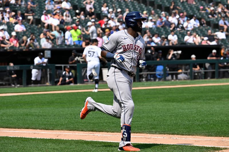 Jun 20, 2024; Chicago, Illinois, USA;  Houston Astros outfielder Yordan Alvarez (44) runs to first base after hitting a RBI single against the Chicago White Sox during the seventh inning at Guaranteed Rate Field. Mandatory Credit: Matt Marton-USA TODAY Sports