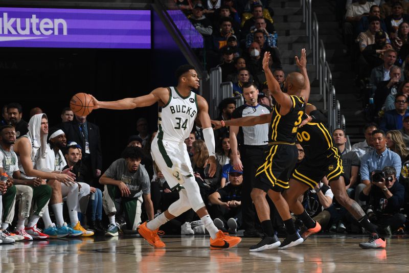 SAN FRANCISCO, CA - MARCH 6:  Giannis Antetokounmpo #34 of the Milwaukee Bucks handles the ball during the game against the Golden State Warriors on MARCH 6, 2024 at Chase Center in San Francisco, California. NOTE TO USER: User expressly acknowledges and agrees that, by downloading and or using this photograph, user is consenting to the terms and conditions of Getty Images License Agreement. Mandatory Copyright Notice: Copyright 2024 NBAE (Photo by Noah Graham/NBAE via Getty Images)