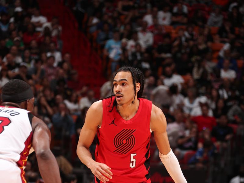 MIAMI, FL - MARCH 29: Dalano Banton #5 of the Portland Trail Blazers dribbles the ball during the game against the Miami Heat on March 29, 2024 at Kaseya Center in Miami, Florida. NOTE TO USER: User expressly acknowledges and agrees that, by downloading and or using this Photograph, user is consenting to the terms and conditions of the Getty Images License Agreement. Mandatory Copyright Notice: Copyright 2024 NBAE (Photo by Issac Baldizon/NBAE via Getty Images)