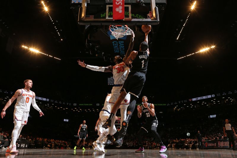 BROOKLYN, NY - JANUARY 23: Mikal Bridges #1 of the Brooklyn Nets drives to the basket during the game against the New York Knicks on January 23, 2024 at Barclays Center in Brooklyn, New York. NOTE TO USER: User expressly acknowledges and agrees that, by downloading and or using this Photograph, user is consenting to the terms and conditions of the Getty Images License Agreement. Mandatory Copyright Notice: Copyright 2024 NBAE (Photo by Nathaniel S. Butler/NBAE via Getty Images)